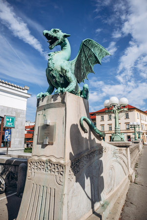 Ljubljana, Slovenia - August 15, 2024: The Dragon Bridge in Ljubljana, an iconic structure crossing the Ljubljanica River, known for its legendary dragon statuesの写真素材