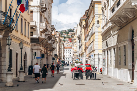 Trieste, Italy - August 18, 2024: A picturesque and beautiful street in the heart of Trieste