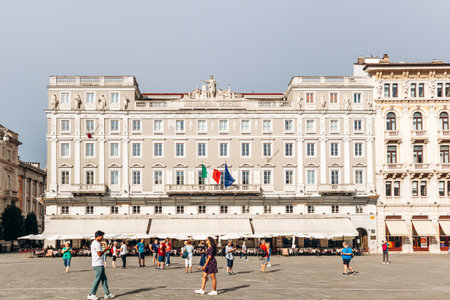 Trieste, Italy - August 18, 2024: Palazzo Stratti, a neoclassical building constructed in 1839 by...