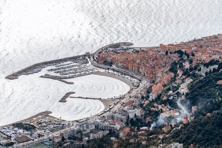Picturesque view of Menton's city center, featuring bright historic buildings with Mediterranean charmの写真素材