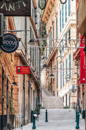 Genoa, Italy - September 22, 2024: Narrow alleys in the historic center of Genoa, showcasing the charm of the old town with its winding streets and traditional architectureのeditorial素材