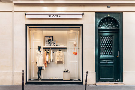 Paris, France - 23 February 2025: Chanel boutique on rue Saint-HonorÃ©, stone facade, black logo, mannequins in window displaysのeditorial素材