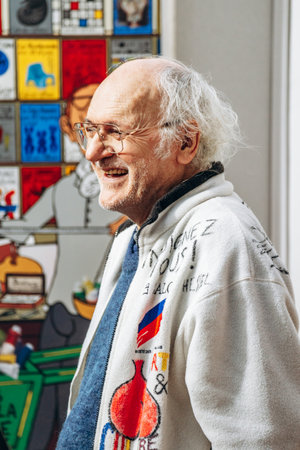 Paris, France - February 22, 2025: The artist at Le Salon des Artistes FranÃ§ais 2025, the historic art exhibition at the Grand Palais, established since the time of Colbert.のeditorial素材