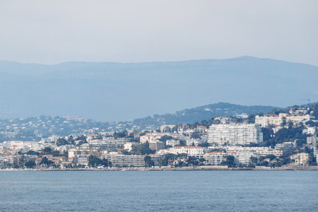 Panoramic view of Cannes city and mountains from Sainte-Marguerite Island.の写真素材