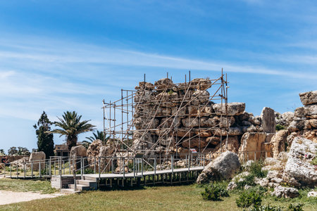 Ancient megalithic Ägantija Temples, a UNESCO World Heritage site on XagÄra plateau, featuring massive limestone blocks and original Neolithic stone architecture under a clear spring skyの写真素材