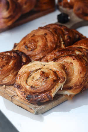 Local cakes and pastries in a central London bakery display