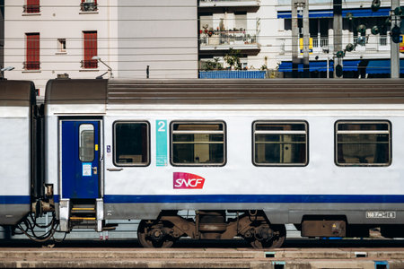 Nice, France - February 9, 2025: SNCF TER regional train standing at the platform of Nice Ville railway stationのeditorial素材