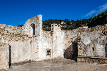 Roquebrune Cap Martin, France - February 9, 2025: Interior courtyard walls of Grimaldi Castle with stone masonry and medieval architectureのeditorial素材