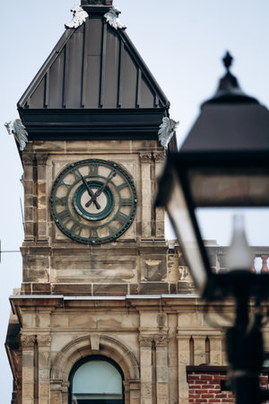 Montreal, Canada - August 14, 2025:  Montreal City Hall clock tower with Roman numerals and vintage...