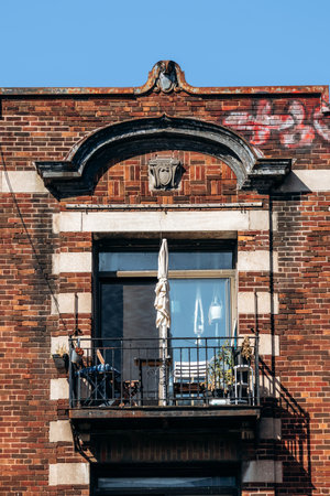 Montreal, Canada â August 12, 2025: Architectural fragments of historic building facades along Saint-Laurent Boulevard in Montreal.のeditorial素材
