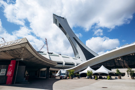 Montreal, Canada - August 14, 2025: Iconic Olympic Stadium Tower landmark rising above the city