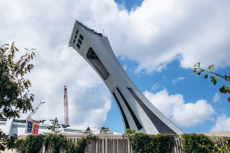 Montreal, Canada - August 14, 2025: Iconic Olympic Stadium Tower landmark rising above the city