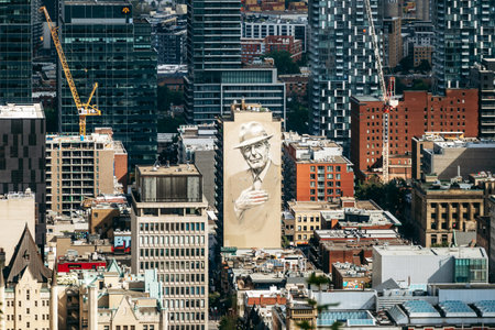 Montreal, Canada - August 15, 2025: Large mural on a building facade seen from Kondiaronk Belvedereのeditorial素材