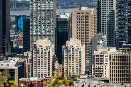 Montreal, Canada - August 15, 2025: City skyline with office towers and residential buildings seen from Kondiaronk Belvedereのeditorial素材