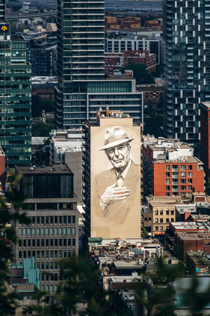Montreal, Canada - August 15, 2025: Large mural on a building facade seen from Kondiaronk Belvedereのeditorial素材