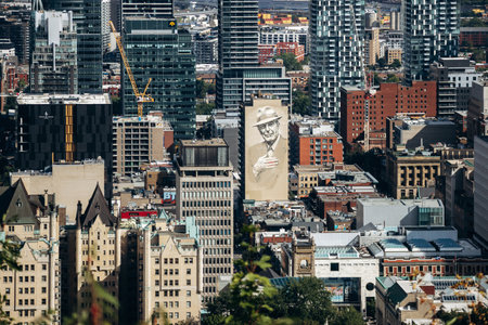 Montreal, Canada - August 15, 2025: Large mural on a building facade seen from Kondiaronk Belvedereのeditorial素材