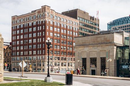 Ottawa, Canada - August 13, 2025: View of the historic Bank of Montreal building on Wellington Street with surrounding downtown architecture in central Ottawaのeditorial素材