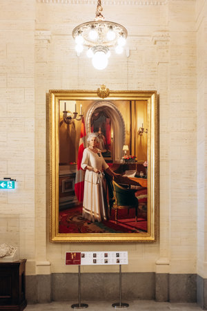 Ottawa, Canada - August 13, 2025: State portrait of Queen Elizabeth II in a white gown by artist...