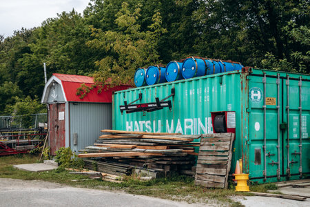 La Baie, Quebec, Canada - August 19, 2025: Industrial container marked â€œHATSU MARINEâ€...
