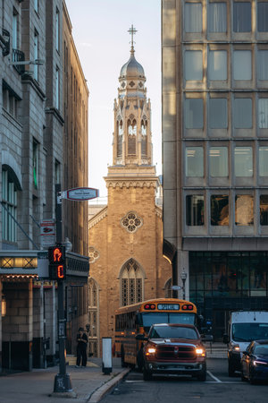Quebec City, Canada - August 23, 2025: View of Saint Jean Street with church tower framed between...