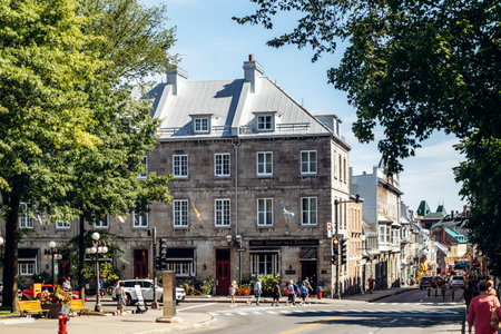 Quebec City, Canada - August 23, 2025: Hotel Manoir de L Esplanade stone building facade with...