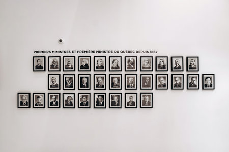 Quebec City, Canada - August 23, 2025: Wall display with portraits of Quebec premiers and prime...