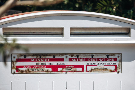 Monaco, Monaco - July 17, 2026: White and red public mailbox with separate slots marked â€œMonacoâ€ and â€œAutres destinationsâ€ (â€œOther destinationsâ€) in Monaco-Ville