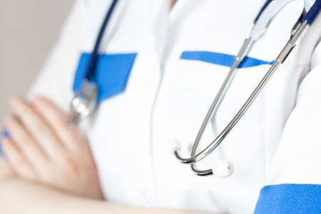 Medicine doctor with stethoscope in hand on hospital background, Medical technology, Healthcare and...