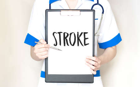 Doctor writing word Stroke with marker, Medical conceptの写真素材