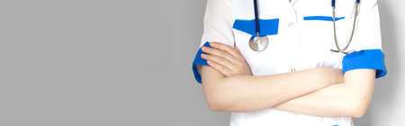 Medicine doctor with stethoscope in hand on hospital background, Medical technology, Healthcare and Medical conceptの写真素材