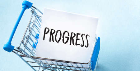 Text progress on the notepad in the shopping cartの写真素材