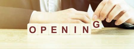 Man made word opening with wood blocksの写真素材