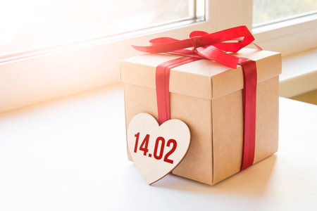 Handmade gift box with sign 14 02 on wooden heart