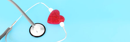 Red heart with stethoscope, heart health, health insurance concept, World heart day, world health...