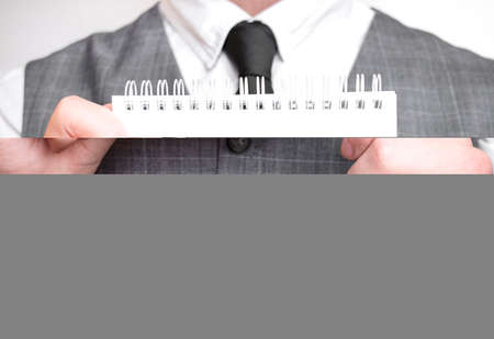 Businessman with notebook with text Time to investの写真素材