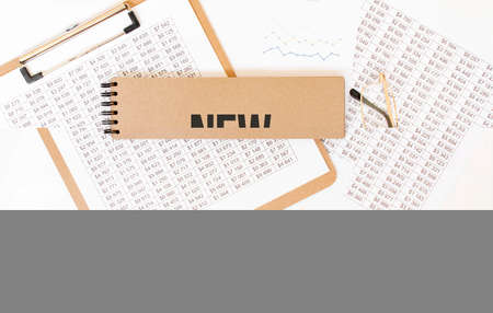 Craft color notepad with text New Directions. Notepad with eyeglasses and text documents. Business...