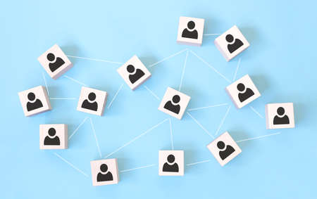Wooden cube block print screen person icon which link connection network for organization structure social network and teamwork concept.の写真素材