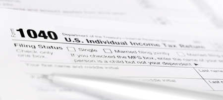 US Individual Income Tax Return form 1040. Tax concept