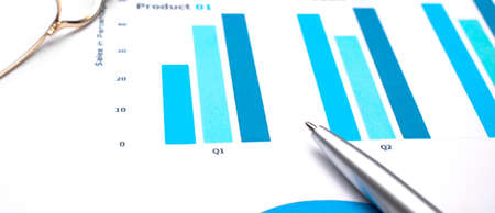 Business Charts Black and blue with calculator, glasses and pen