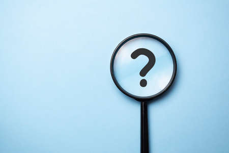 Magnifying glass with question mark symbol. Concept creative idea and innovation