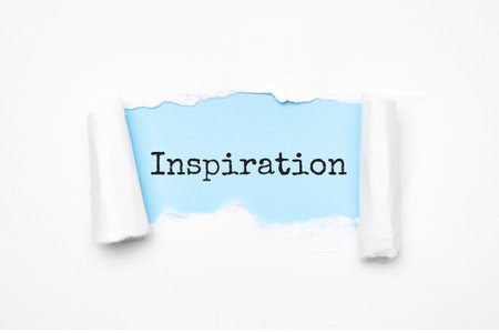 Concept of discovering Inspiration tricks. Uncovered unrolled beige torn paper and search engine...