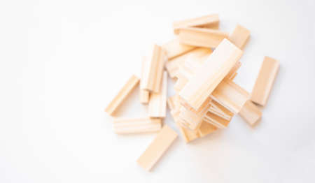 The tower stack from wooden blocks toy with sky background. Learning and development concept.の写真素材
