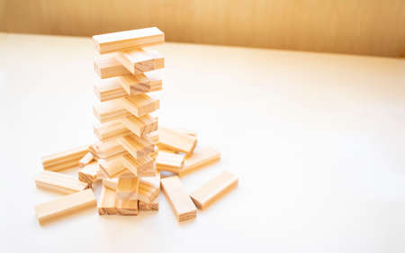 Wood blocks stack game with copy space, background. Concept of education, risk, development, and growthの写真素材