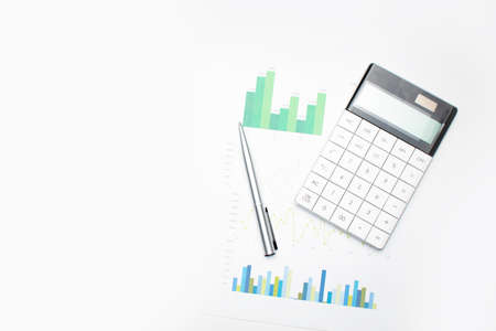 Calculator with pen on financial data. Concept of Business and Finance research .の写真素材