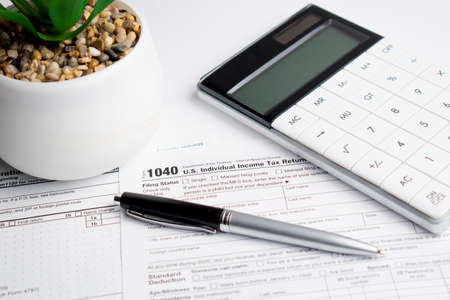 Income tax form and pen. Finance concept.の写真素材