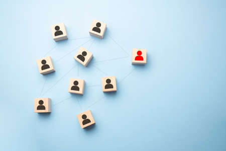 Human resource management and recruitment business concept, Hand putting wood cube block on top...