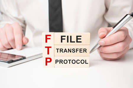 ftp sign on wooden block on table background.の写真素材