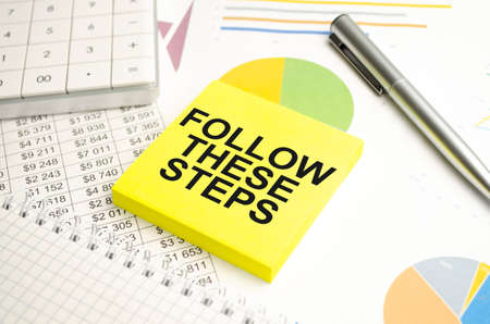 Follow These Steps on the paper. conceptの写真素材