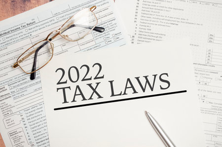 Paper with 2022 Tax Laws on a tableの写真素材