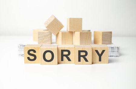 sorry word written on wood block. sorry text on tableの写真素材
